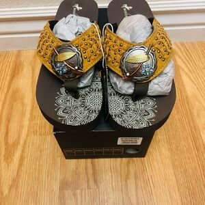 Montana West feather and flower flip flops